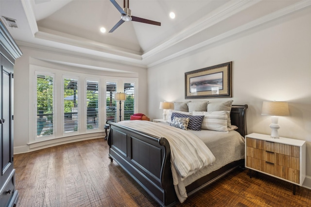 bedroom featuring a raised ceiling, ceiling fan, crown molding, and dark wood-type flooring