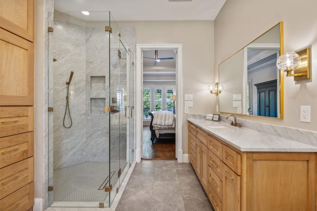 bathroom with tile patterned floors, vanity, and a shower with shower door