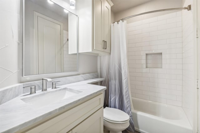 full bathroom featuring shower / bath combo, toilet, and vanity