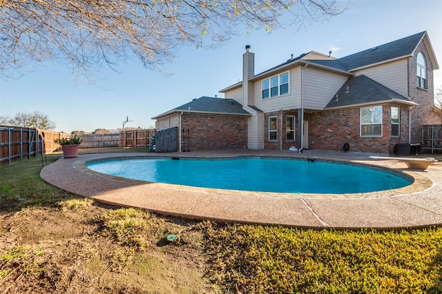 view of pool with a patio