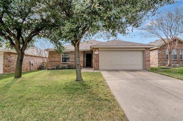 single story home featuring a front yard and a garage