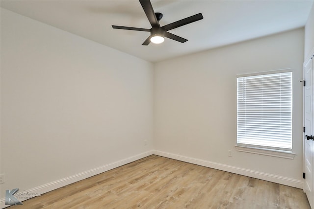 spare room featuring ceiling fan and light hardwood / wood-style flooring