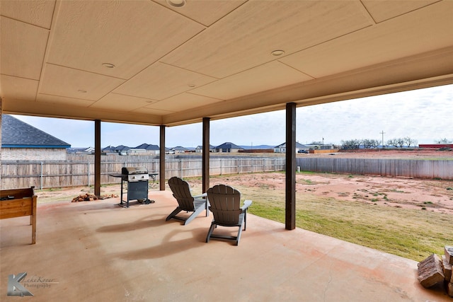 view of patio featuring a grill