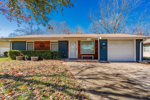 ranch-style home with a garage