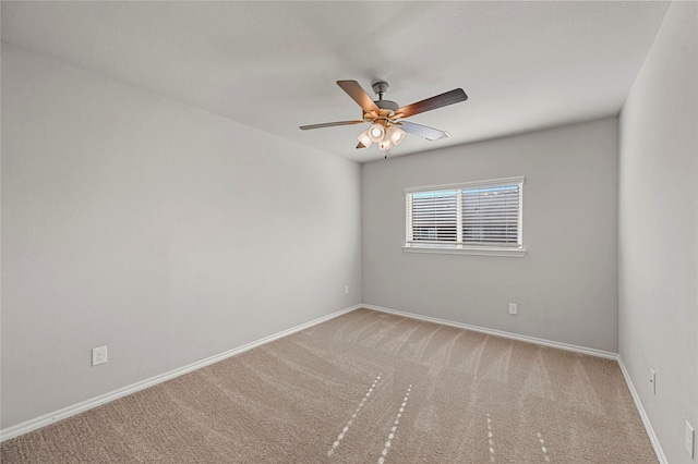 empty room with carpet floors and ceiling fan