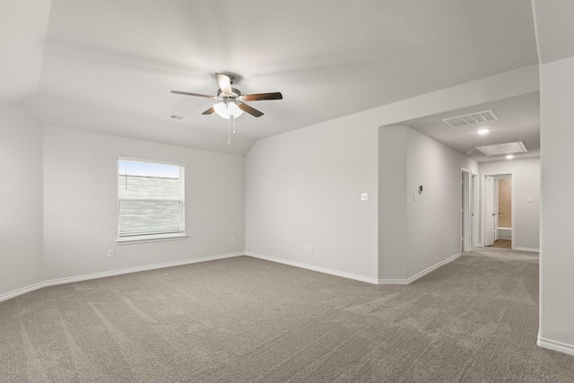 spare room with carpet, lofted ceiling, and ceiling fan