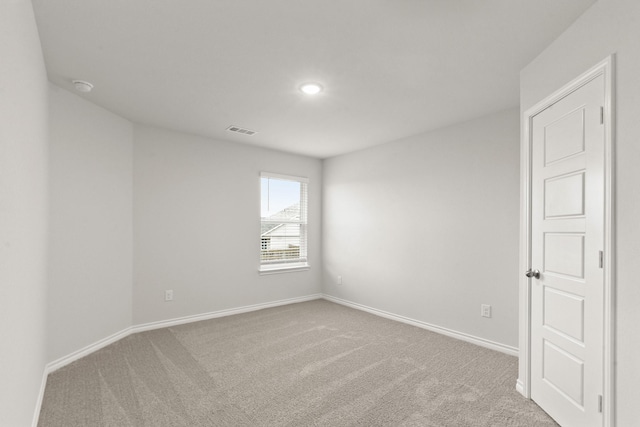 empty room featuring carpet floors