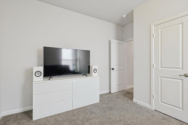 unfurnished bedroom with light carpet