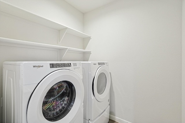 laundry room with washer and dryer