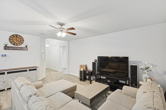 living room with ceiling fan