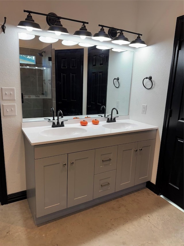 bathroom with vanity and walk in shower