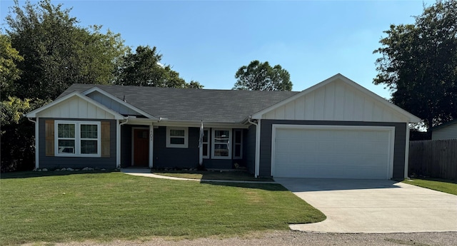 ranch-style house with a garage and a front lawn