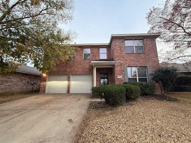 front of property featuring a garage