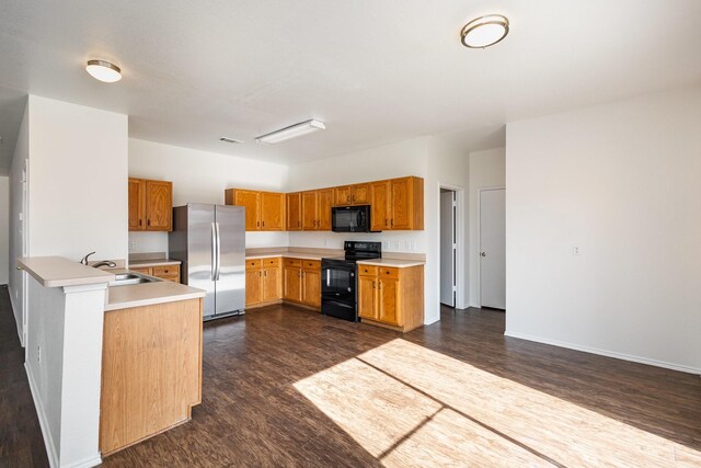 bathroom featuring hardwood / wood-style floors and toilet