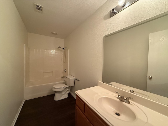 full bathroom with shower / tub combination, hardwood / wood-style floors, vanity, and toilet