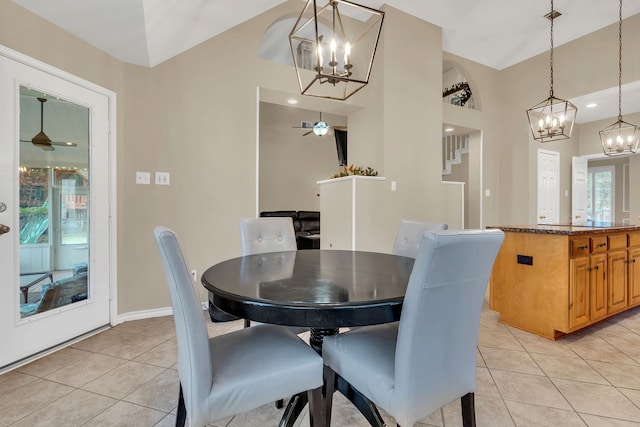 dining room with ceiling fan and light tile patterned floors