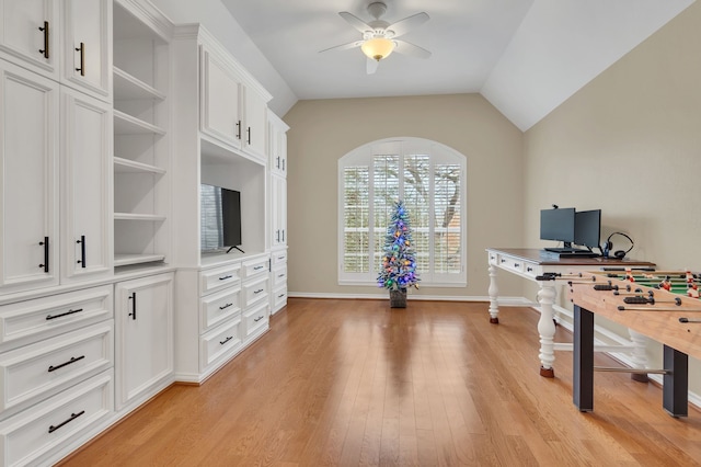 office space with light hardwood / wood-style floors, vaulted ceiling, and ceiling fan