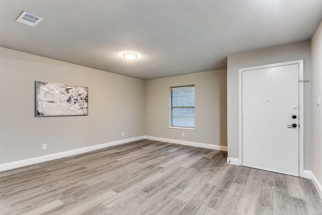 foyer entrance featuring light hardwood / wood-style flooring