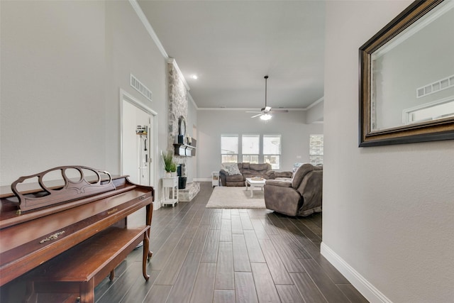 hallway featuring dark hardwood / wood-style flooring and ornamental molding