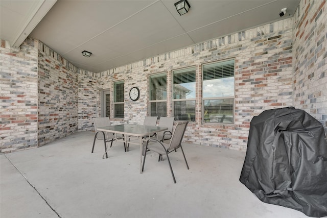 view of patio with a grill