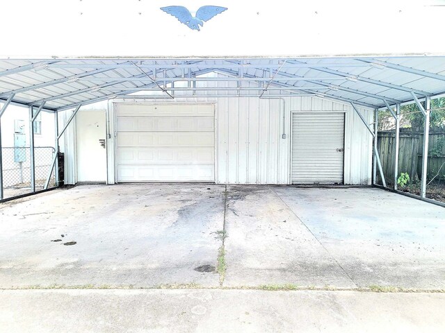 garage featuring a carport