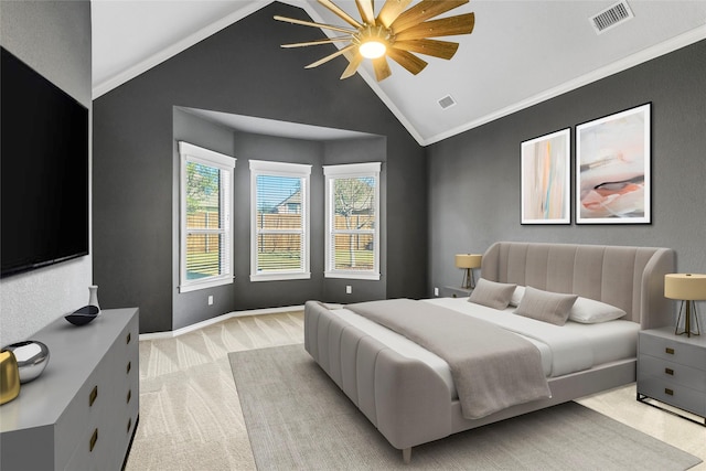 carpeted bedroom featuring ornamental molding, vaulted ceiling, and ceiling fan