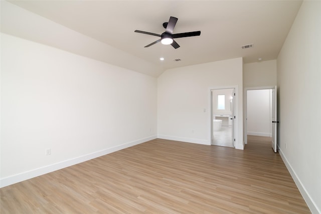 unfurnished room featuring vaulted ceiling, ceiling fan, and light hardwood / wood-style floors