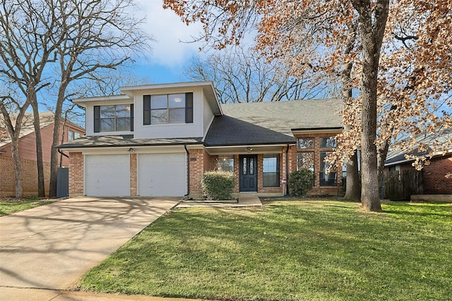 view of front of house featuring a garage and a front yard