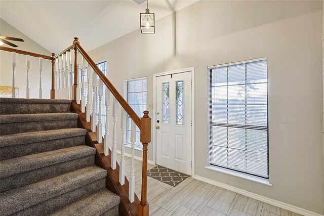 foyer with lofted ceiling