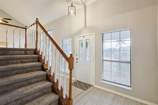 foyer entrance featuring lofted ceiling