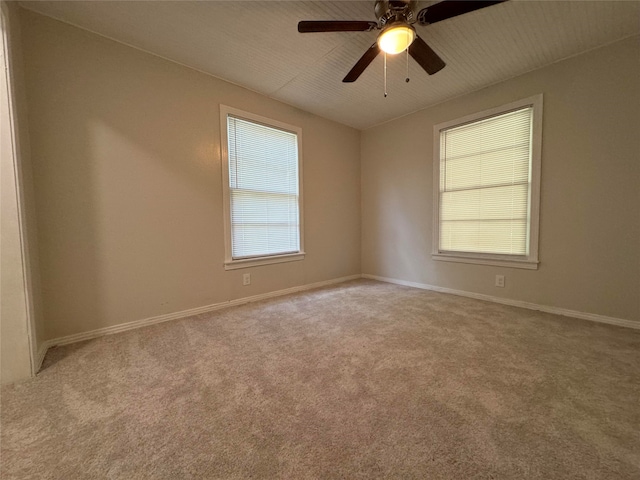 unfurnished room with light carpet and ceiling fan