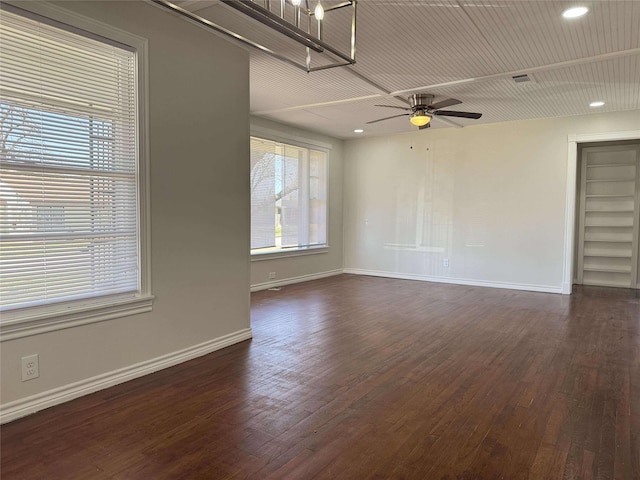 unfurnished room with recessed lighting, dark wood-style floors, baseboards, and ceiling fan