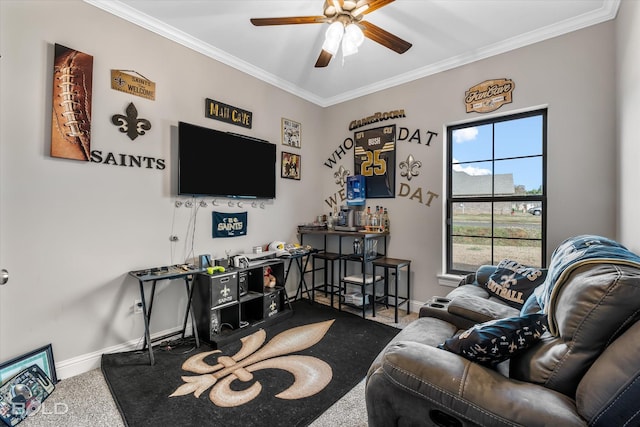 living room featuring crown molding, ceiling fan, and carpet