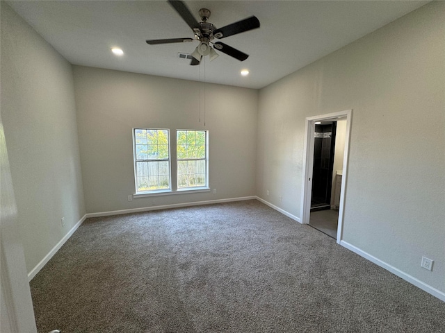 empty room with carpet flooring and ceiling fan