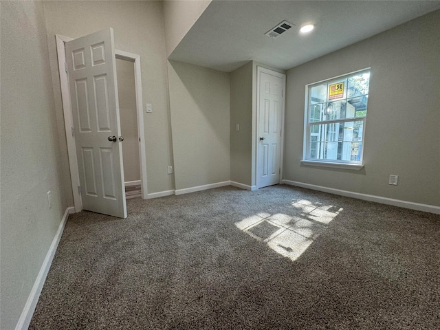 unfurnished bedroom featuring carpet flooring