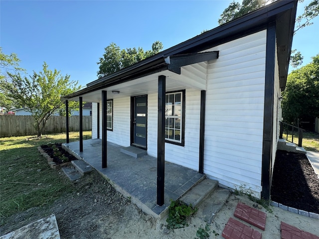 view of home's exterior featuring covered porch