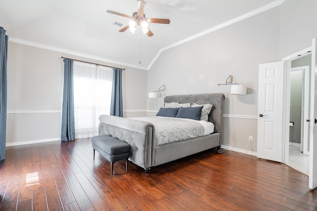 bedroom with ceiling fan, dark hardwood / wood-style floors, vaulted ceiling, and ornamental molding