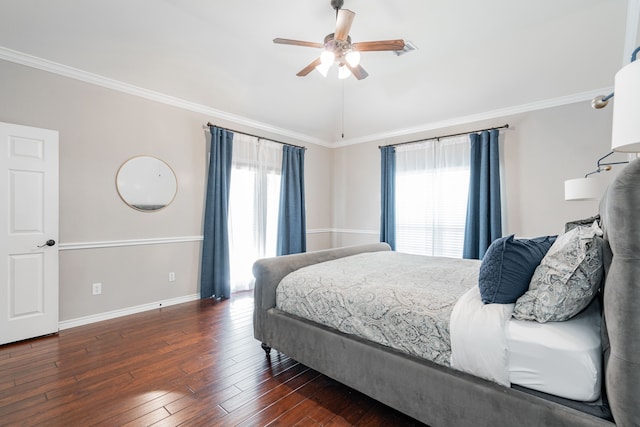 bedroom with lofted ceiling, dark hardwood / wood-style flooring, ceiling fan, and ornamental molding