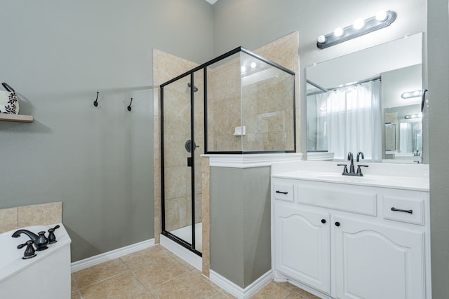 bathroom with vanity, tile patterned floors, and an enclosed shower