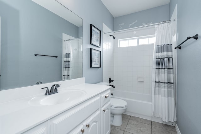 full bathroom featuring tile patterned floors, vanity, shower / bath combination with curtain, and toilet