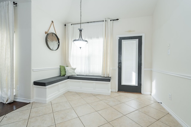 mudroom with light tile patterned floors