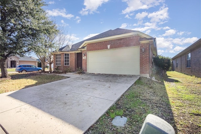 ranch-style home featuring a front yard and a garage