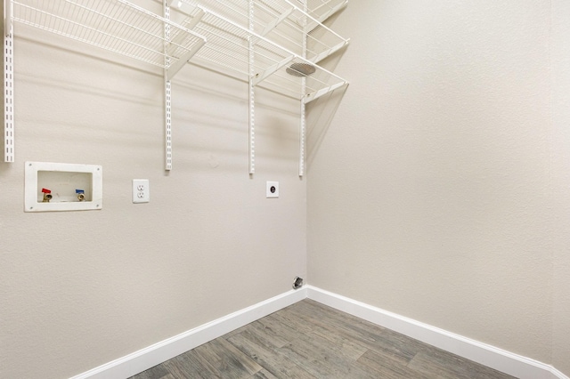 clothes washing area featuring hardwood / wood-style floors, washer hookup, and hookup for an electric dryer