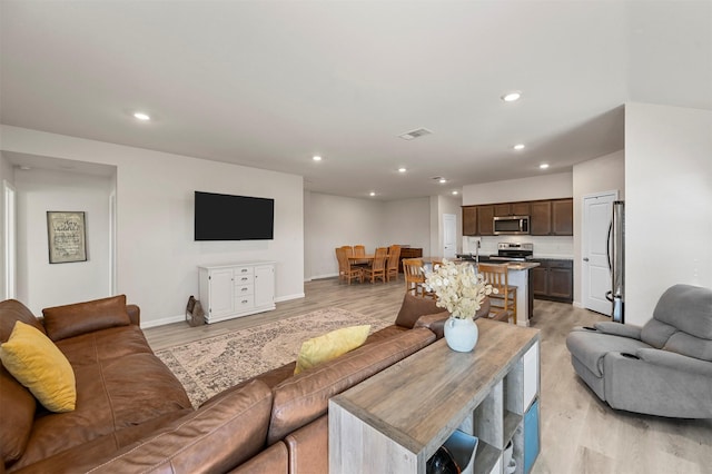 living room featuring light hardwood / wood-style flooring