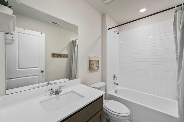 full bathroom featuring vanity, toilet, and shower / bathtub combination with curtain