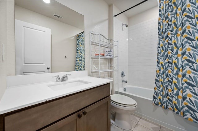 full bathroom with tile patterned flooring, shower / bath combination with curtain, vanity, and toilet