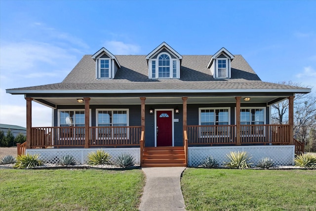 view of front of home featuring covered porch and a front yard