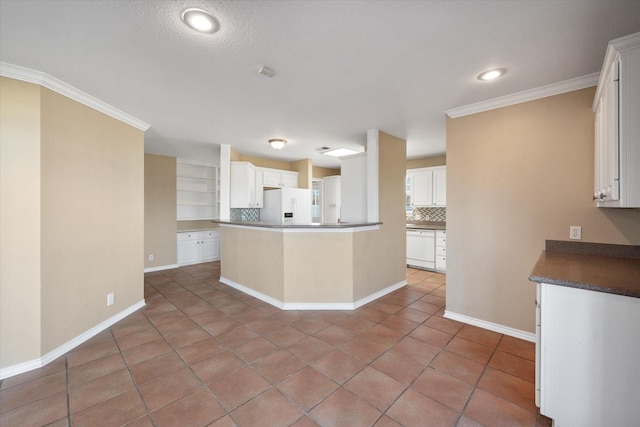 kitchen featuring white cabinetry, ornamental molding, backsplash, and white appliances