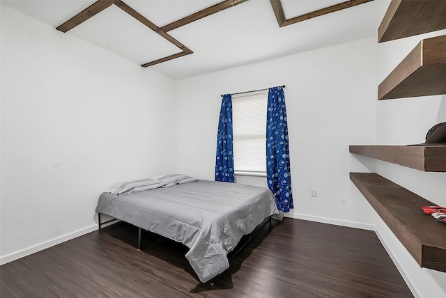 bedroom featuring dark wood-type flooring