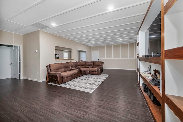 living room with dark hardwood / wood-style flooring